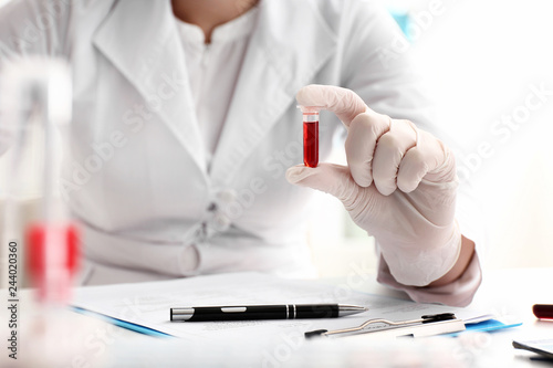 Woman working with blood sa...