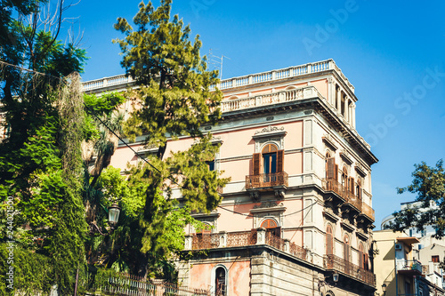 Travel to Italy - historical street of Catania, Sicily, facade of old buildings.