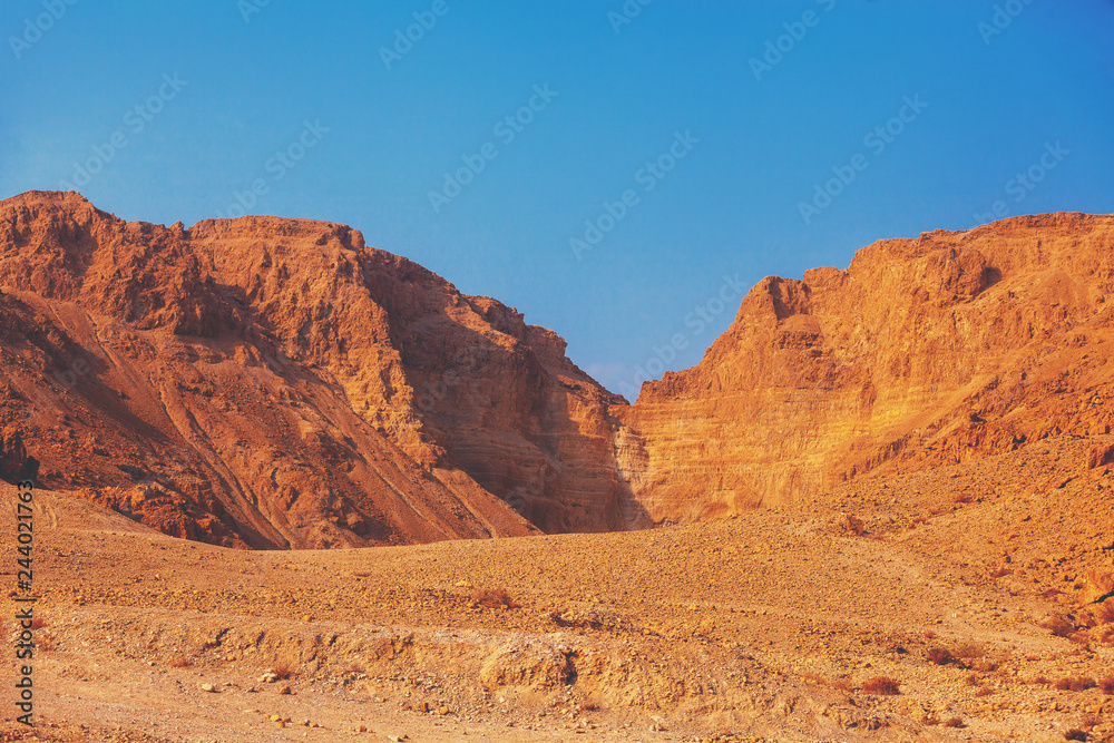 Mountain desert. Sandstone mountains against the blue sky