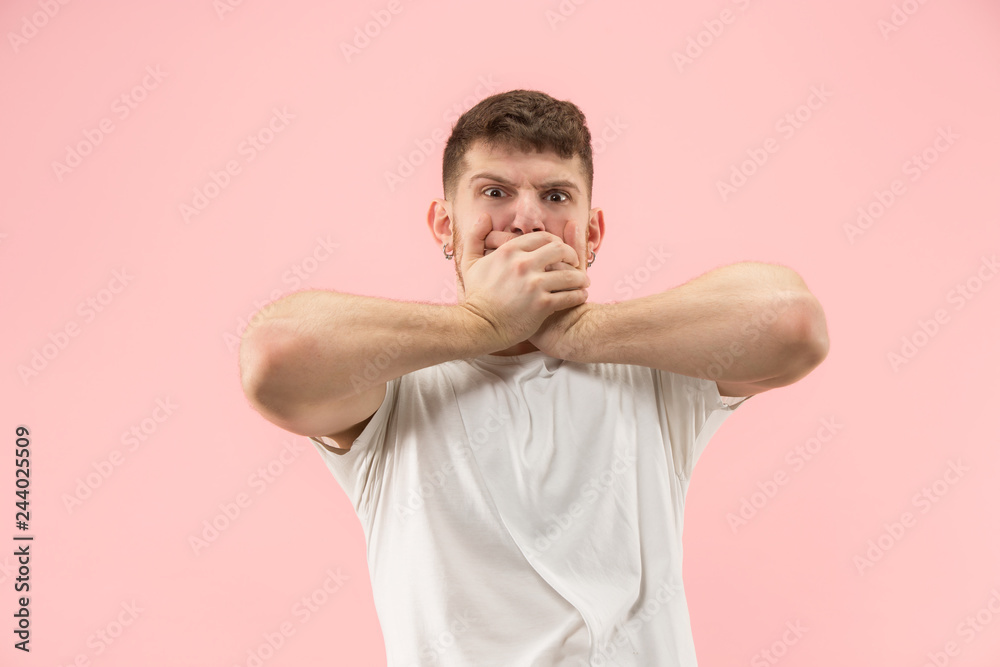 Why is that. Beautiful male half-length portrait isolated on trendy pink studio backgroud. Young emotional surprised, frustrated and bewildered man. Human emotions, facial expression concept. Why is that. Beautiful male half-length portrait isolated on trendy pink studio backgroud. Young emotional surprised, frustrated and bewildered man. Human emotions, facial expression concept.