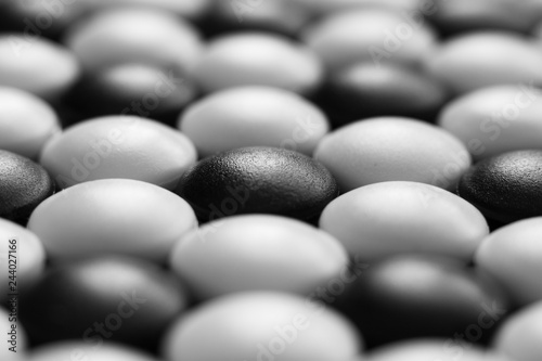 Photography Background of black and white stones Go game. Close-up