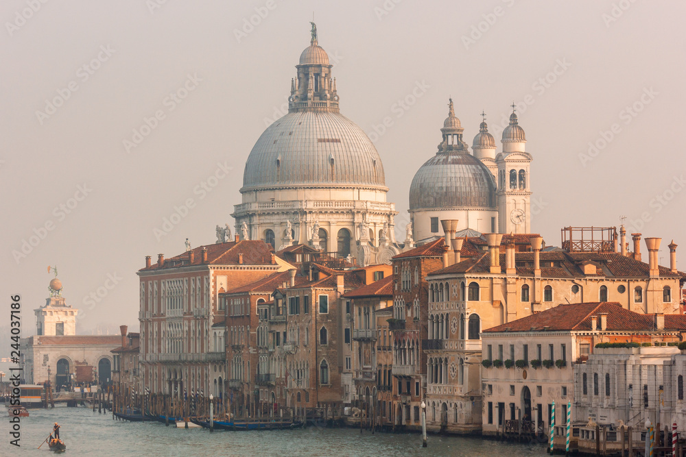 View to the Grand Canal and Basilica di Santa Maria della Salute from the Ponte dell'Accademia in Venice, Italy
