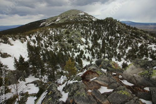 Russian nature. Alpine landscape. The Ural mountains. Taganay National Park. “Russian Switzerland” and the “Ural Tyrol”. It is located near Zlatoust, Chelyabinsk district photo