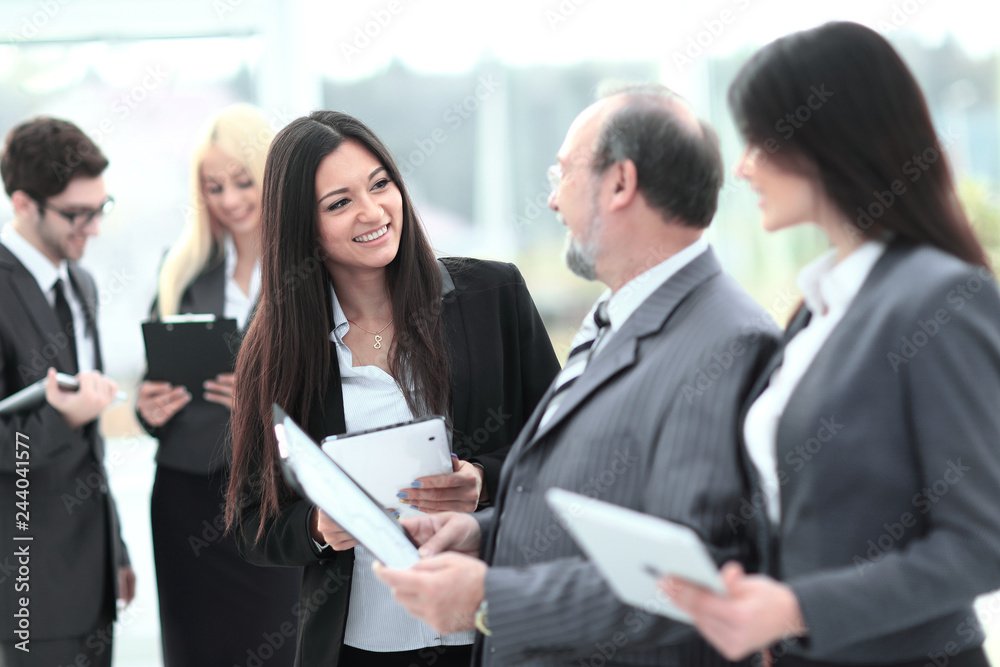 close up.group of business people preparing to start a business meeting close up.group of business people preparing to start a business meeting