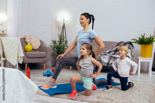 Nice active children sitting on one knee