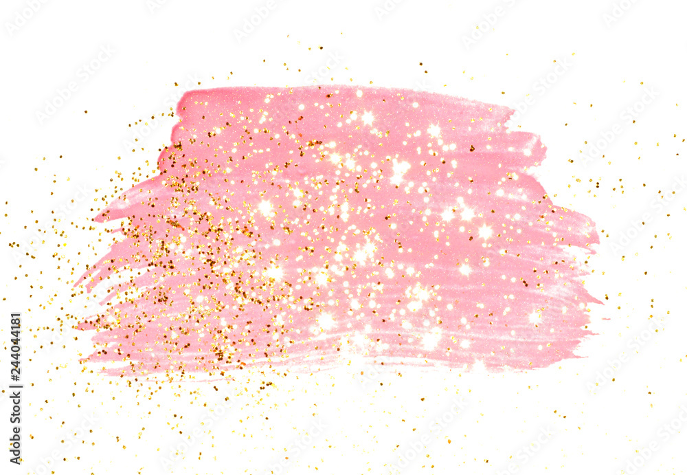 Golden glitter on abstract pink watercolor splash on white background