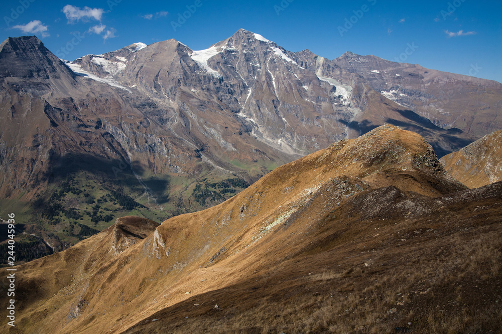 View of mountain with blue sky from Grossglockner High Alpine Road in Austria