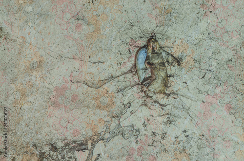 figur an einer wand photo