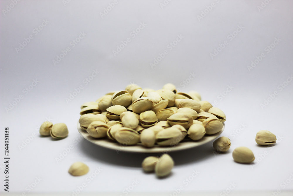 pistachios on a white background pistachios on a white background