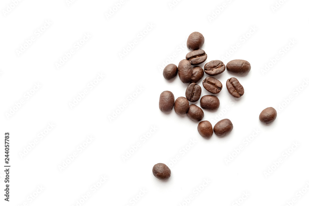 Coffee beans isolated on white background. Close-up. Coffee beans isolated on white background. Close-up.