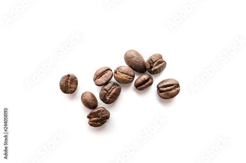 Coffee beans isolated on white background. Close-up.