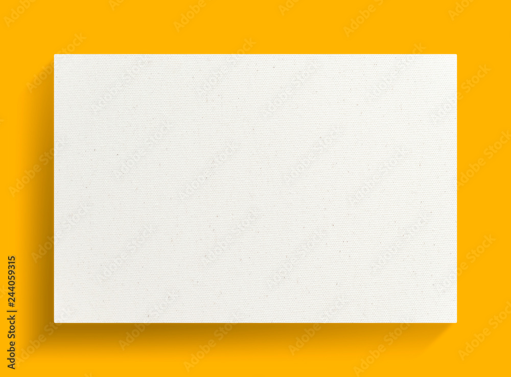 White canvas frame on yellow background.