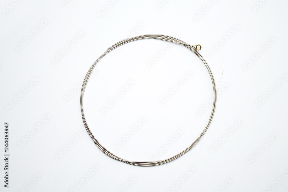 new electric guitar strings close up isolated on white background new electric guitar strings close up isolated on white background
