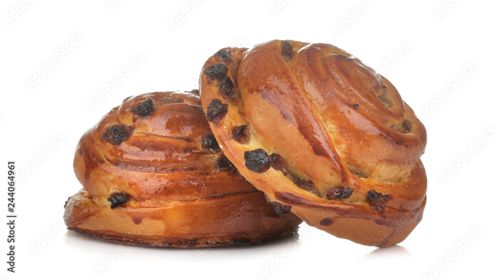 Tasty buns with raisins on a white isolated background. fresh bakery. close-up. Tasty buns with raisins on a white isolated background. fresh bakery. close-up.