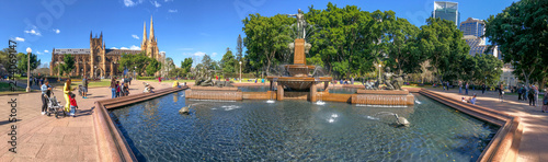 SYDNEY, AUSTRALIA - AUGUST 19, 2018: Locals and tourists enjoy Archibald Fountain in Hyde Park. This is a major destination in Sydney