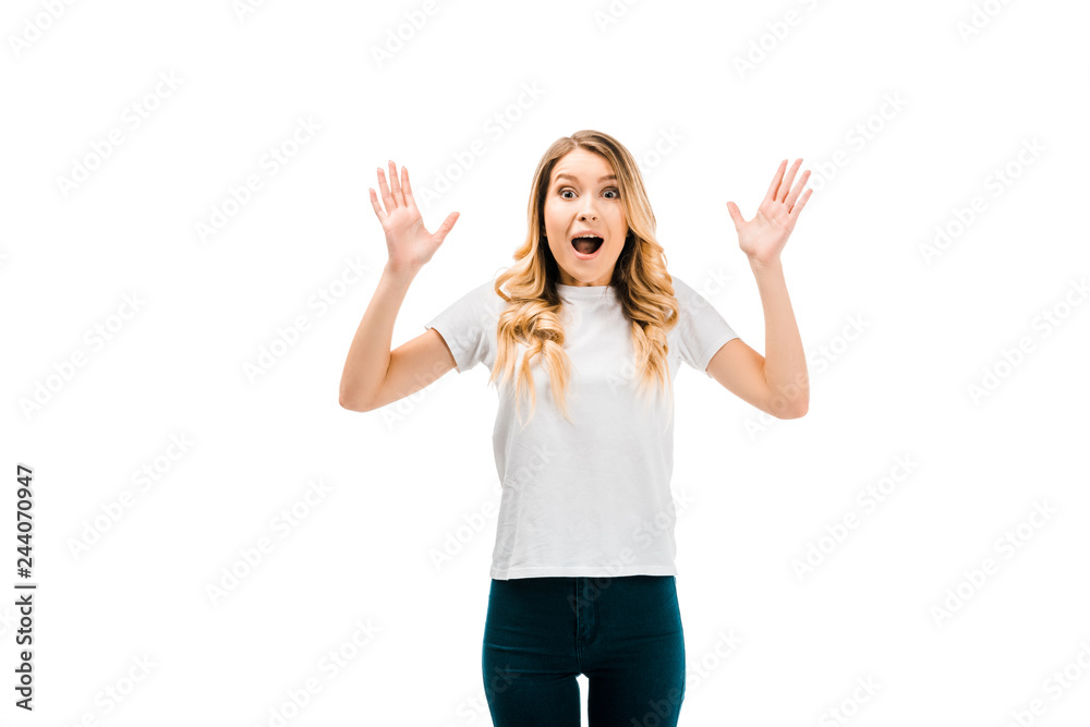 shocked young woman gesturing with hands and looking at camera isolated on white shocked young woman gesturing with hands and looking at camera isolated on white