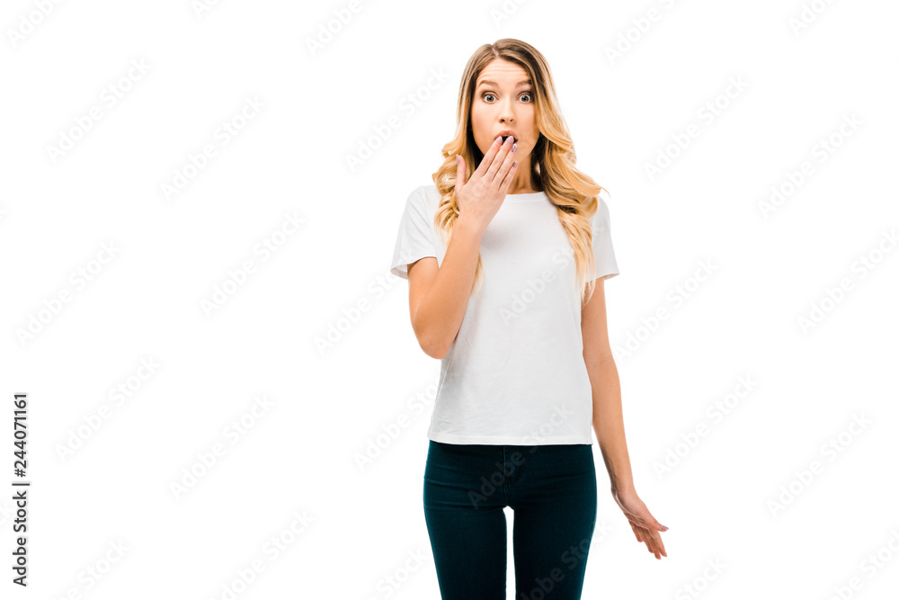 shocked young woman in white t-shirt looking at camera isolated on white shocked young woman in white t-shirt looking at camera isolated on white