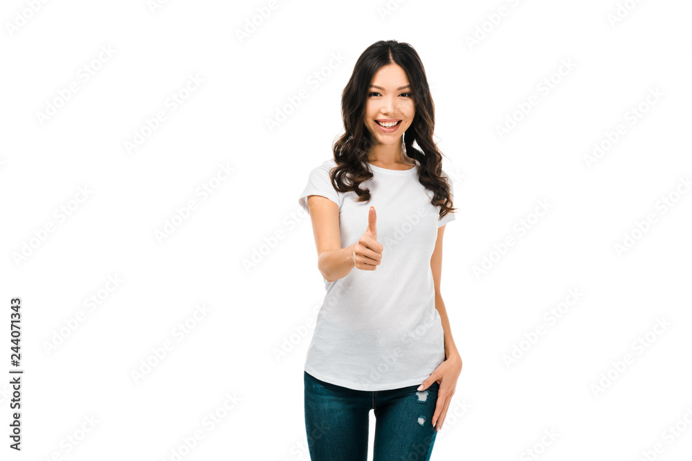 beautiful happy brunette girl showing thumb up and smiling at camera isolated on white beautiful happy brunette girl showing thumb up and smiling at camera isolated on white