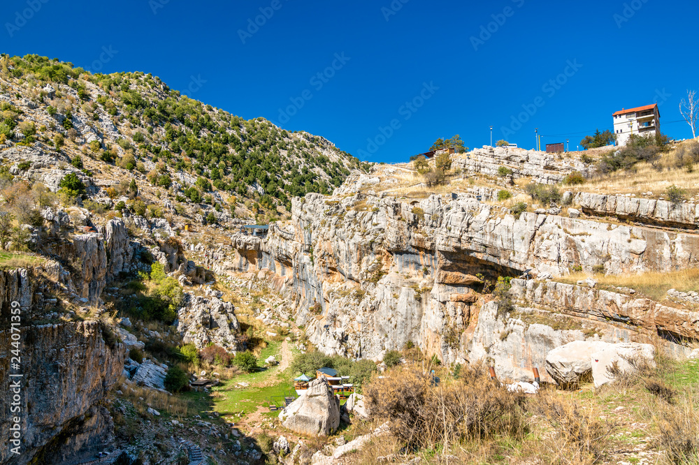 Naklejka premium Rocks at the Baatara gorge sinkhole in Tannourine, Lebanon