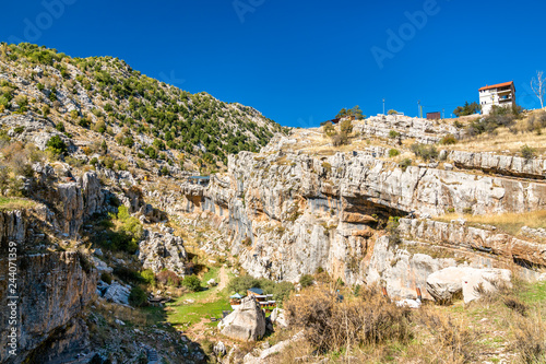 Rocks at the Baatara gorge sinkhole in Tannourine, Lebanon photo
