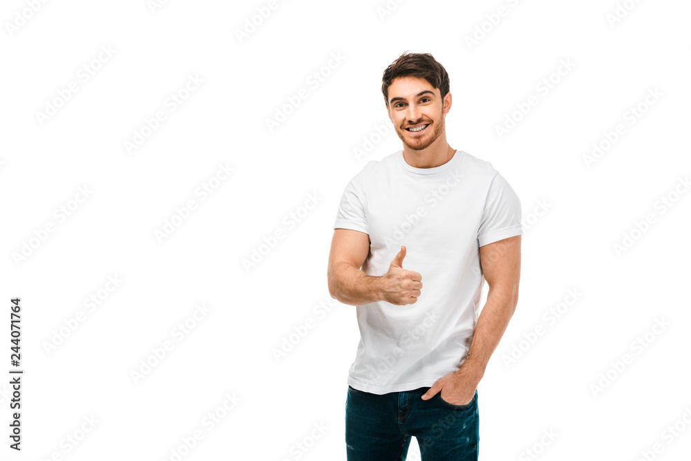 handsome happy man showing thumb up and smiling at camera isolated on white handsome happy man showing thumb up and smiling at camera isolated on white