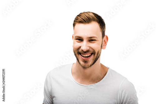 portrait of handsome bearded young man in white t-shirt smiling at camera isolated on white © LIGHTFIELD STUDIOS