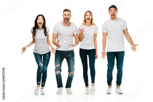 shocked young people screaming and looking at camera isolated on white