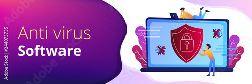 A man before laptop with shield and lock on the screen. Anti virus software, anti-malware, spyware, trojan, adware as internet security concept. Violet palette.Header or Footer banner.