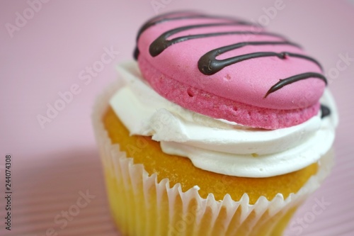 Delicious cakes on wooden background.Sweet dessert for coffee. photo