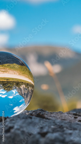 Smartphone HD wallpaper of crystal ball alpine landscape shot at the big maple ground Hinterriss - Austria