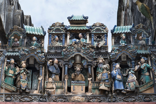 Ba Thien Hau Pagoda with ceramic figures, called smiling sculpture, because of their cheerfull, happy faces, Saigon