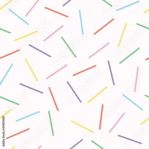 Hand drawn vector tiny confetti sprinkles . Seamless repeat pattern. Kawaii pastel flat color illustration for birthday party and kids celebration backgrounds.