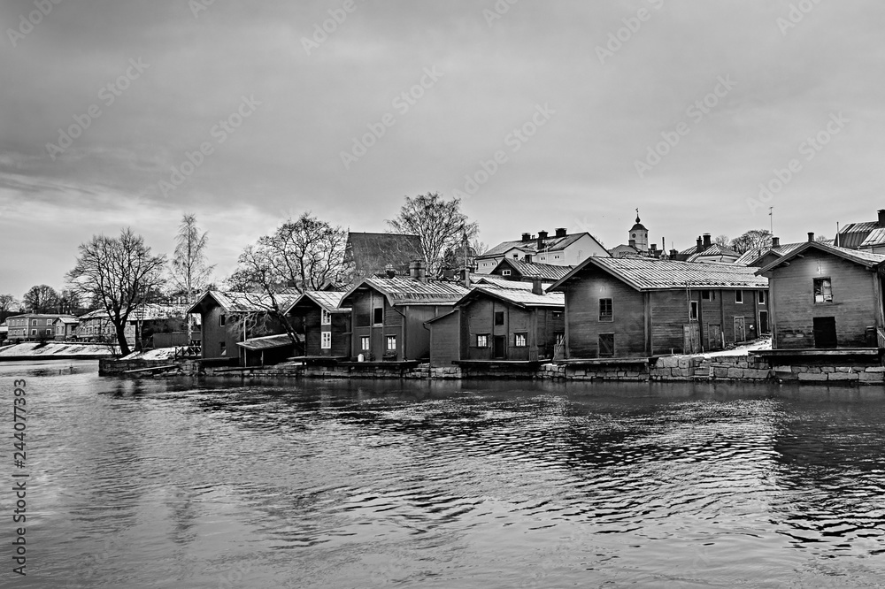 Obraz premium Old historic Porvoo, Finland with wooden houses and medieval stone and brick Porvoo Cathedral at blue hour sunrise