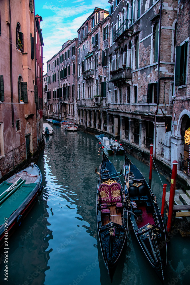 View of the Venice Canal with boats and gondolas