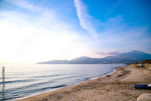 dirty beach with mountains
