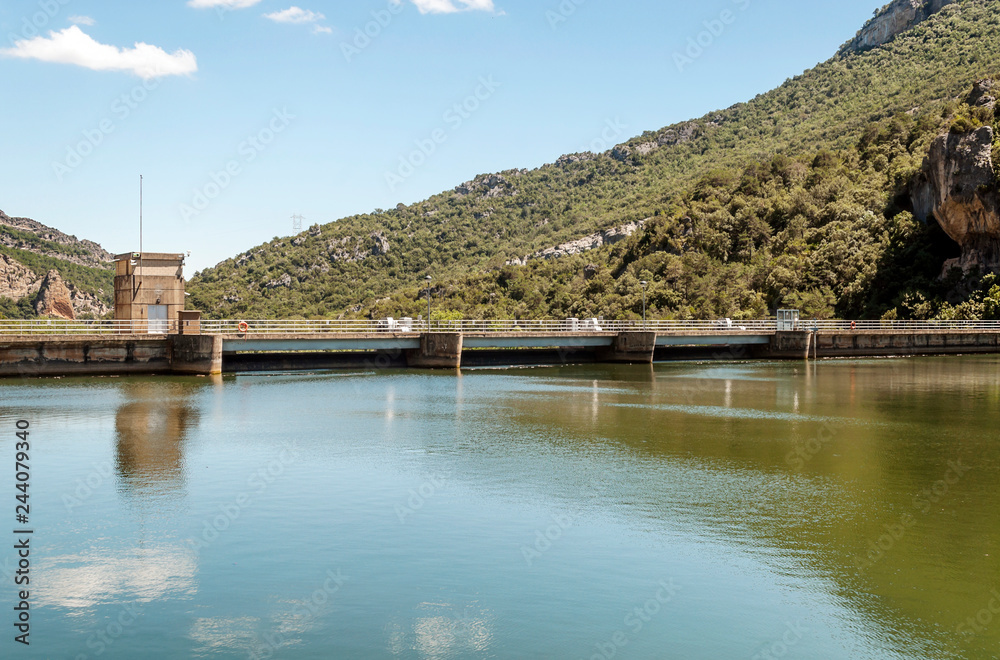 Lake in the mountains of the province of Burgos in spain un a sunny day.