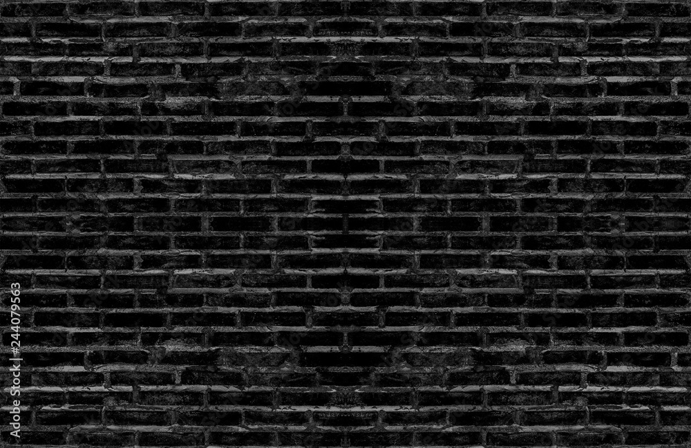 dirty old black brick textured wall for dark tone vintage interior design background. or brick mapping for 3d texture.