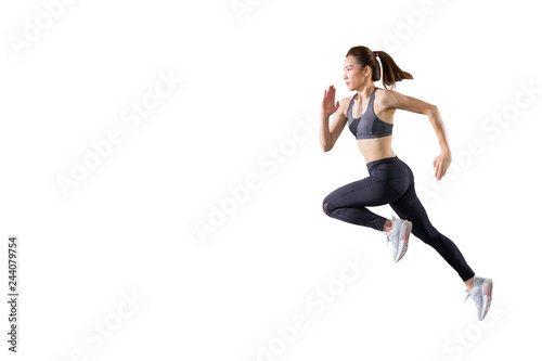 young asian fitness woman in sportwear running isolated on white background . excited runner , jumping girl with copy space