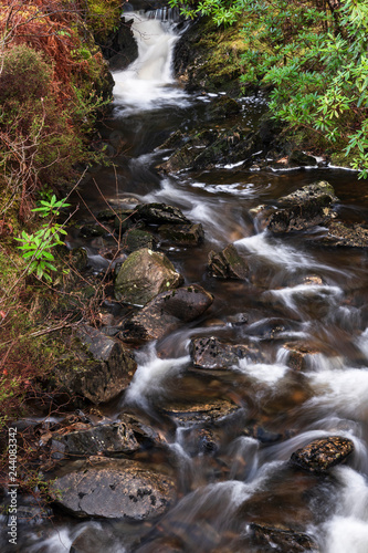 Milky water s flowing off the hills and down the burns in Moidart on the west coast of Scotland