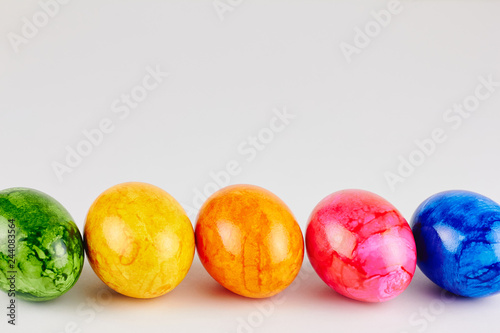 Colored Easter eggs on white background