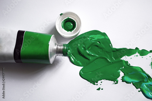 green paint tube. painting flat lay concept