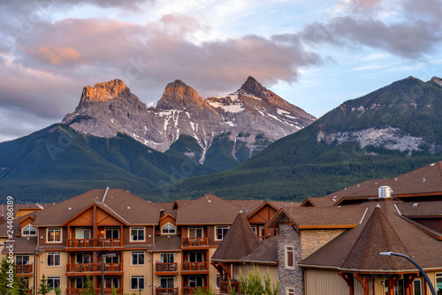 The Three Sisters - A Spring sunset view of The Three Sisters mountain, seen from town of Canmore, Alberta, Canada. photo