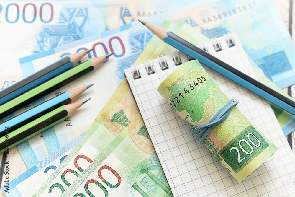 Russian money, notepad and pencil. Business still-life Russian money, notepad and pencil. Business still-life