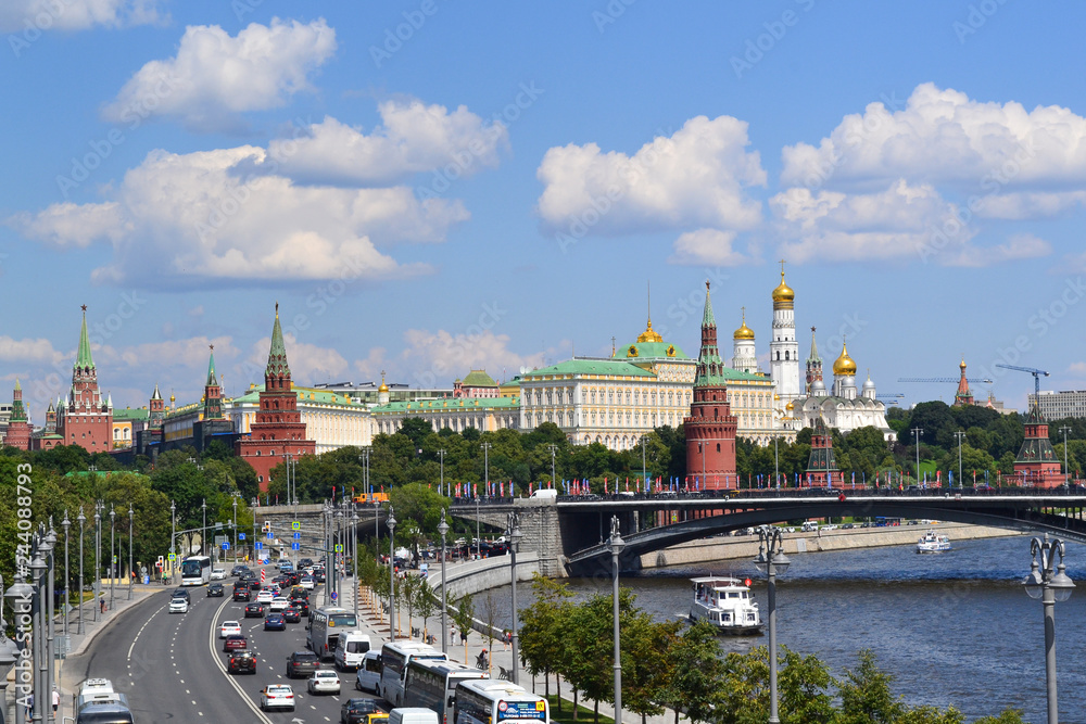 Moscow. Russia. July 2018. - Panoramic view of the Moscow River, the Kremlin on a sunny summer day. Movement along the embankment and across the bridge