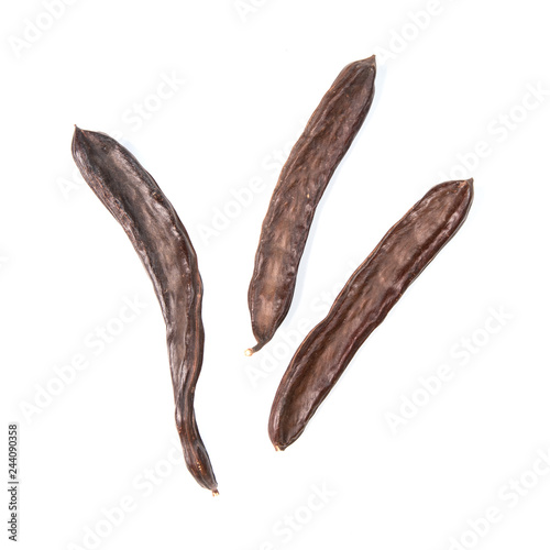 The carob pods isolated on white