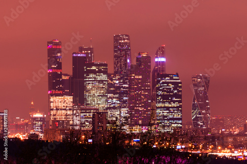 The panorama of Moscow  Russia with Moskva city skyscrapers in the winter cloudy night. The view from the observation platform of Sparrow Hills 