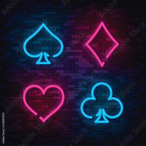 Neon Suit Poker and Casino on brick wall. Vector illustration.
