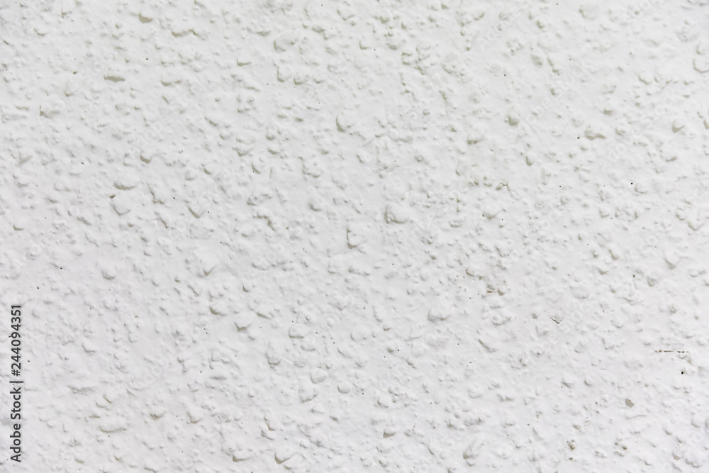 White wall painted with gotele technique White wall painted with gotele technique