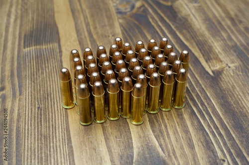 ready bullets on wooden table