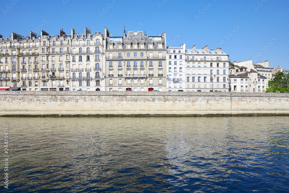 Paris buildings facades and Seine river in a sunny summer day in France